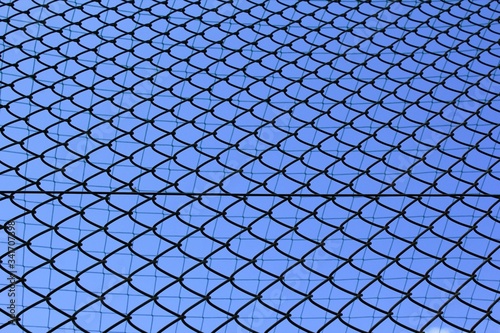 Chain link fence with wire