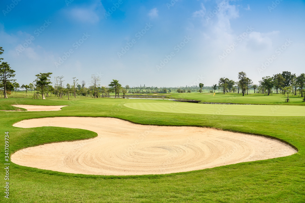 Sand bunker on the beautiful golf course Sand bunker on the beautiful golf course