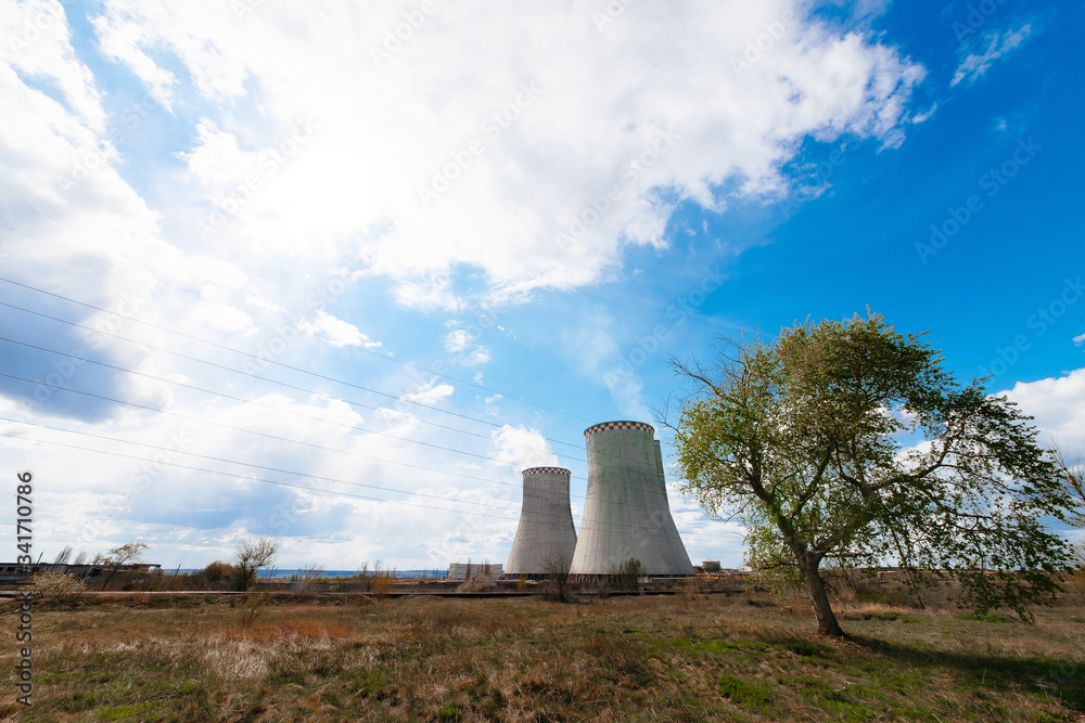 Nuclear power plant in spring landscape
