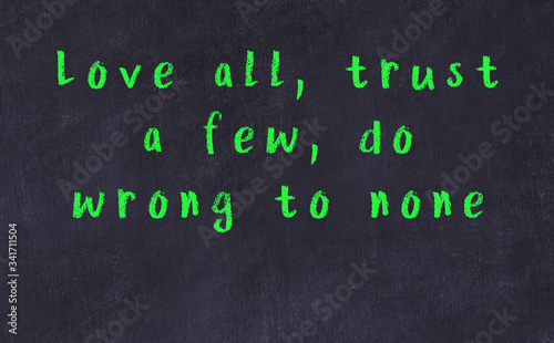 Black chalkboard with wise inscription on it