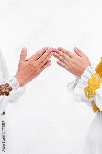 portrait of daughters and mothers hand gesture greet each other apologizing