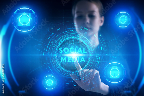 Business, Technology, Internet and network concept. Young businessman working on a virtual screen of the future and sees the inscription: Social media