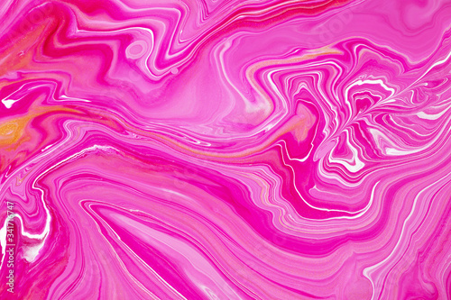 Fluid art texture. Background with abstract mixing paint effect. Liquid acrylic picture with artistic mixed paints. Can be used for baner or wallpaper. Golden  red and pink overflowing colors