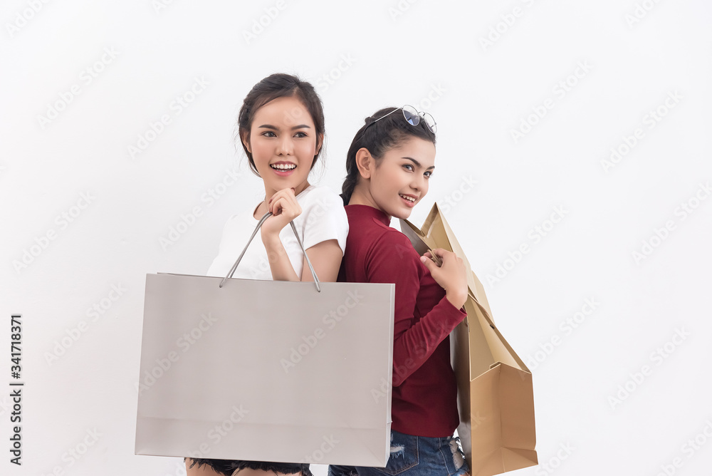 Happy asian shopping woman hold shopping bags in hand enjoy in lifestyle shopping concept, in midnight sales and discount on seales. Happy asian shopping woman hold shopping bags in hand enjoy in lifestyle shopping concept, in midnight sales and discount on seales.