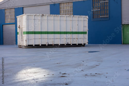 ship container at the gate of a factory