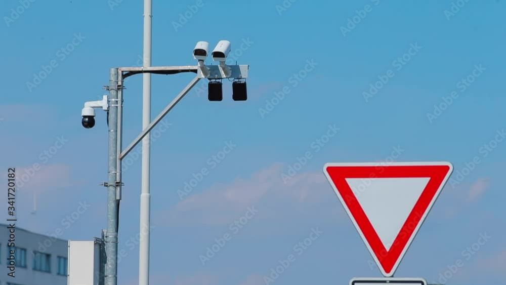 CCTV cameras on the street. Face recognition. Remote policing. Control of sick people Coronavirus infection COVID-19. CCTV cameras on the street. Face recognition. Remote policing. Control of sick people Coronavirus infection COVID-19.
