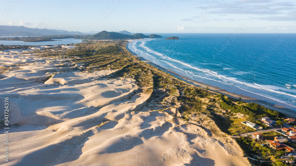 Aerial view of Ribanceira dunes and beach, in Imbituba - SC. Beautiful landscape in Santa Catarina, Brazil