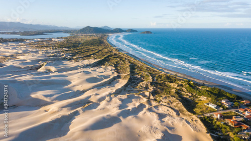 Aerial view of Ribanceira dunes and beach, in Imbituba - SC. Beautiful landscape in Santa Catarina, Brazil