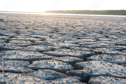 The ground is dry from bad weather.