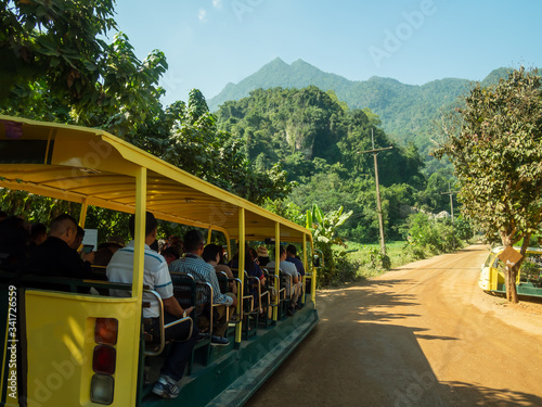 Tour bus Tham Luang cave - Khun Nam Nang Non Forest Park in Chiang Rai Province of Thailand. photo