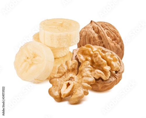 Fresh sliced bananas and walnuts nuts isolated on white background