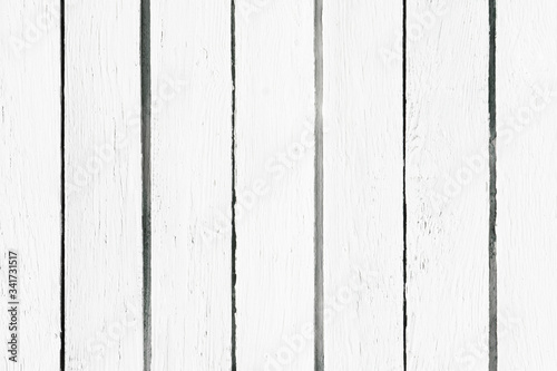 White wood background. Bright paint desk texture. Simple wooden wall pattern. Vintage rustic plank board.