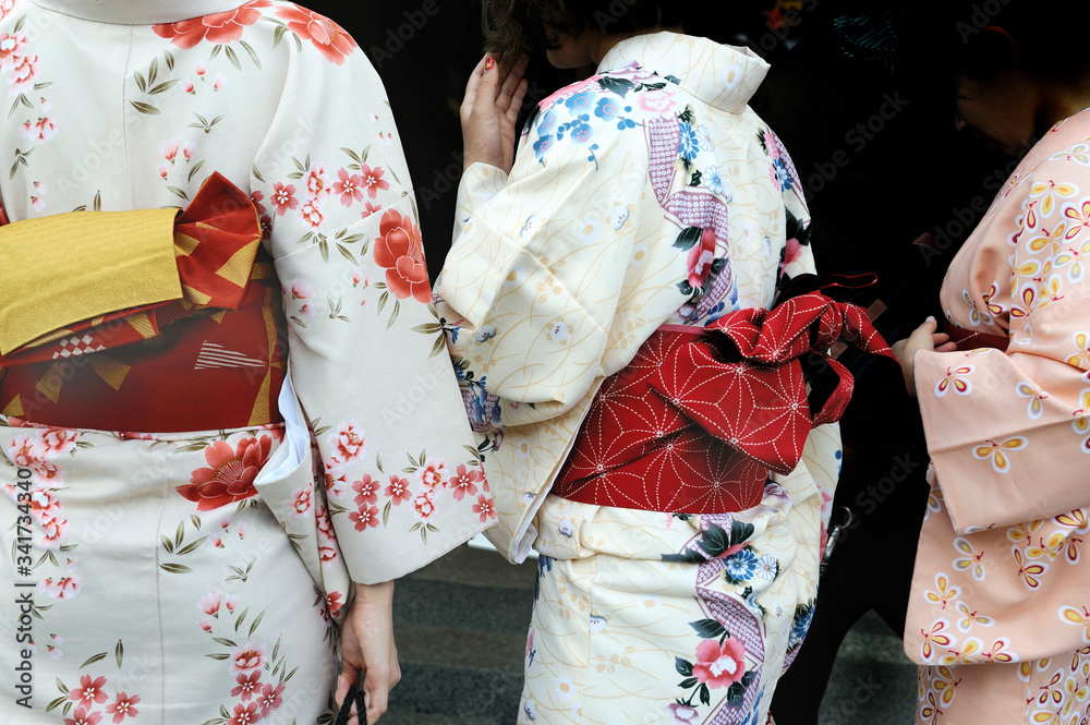 Geishas wearing kimonos