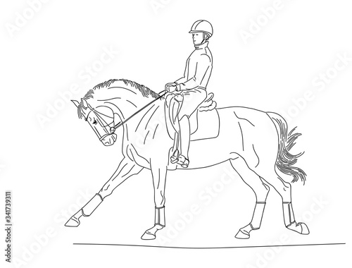 Young rider man in helmet on a dressage horse
