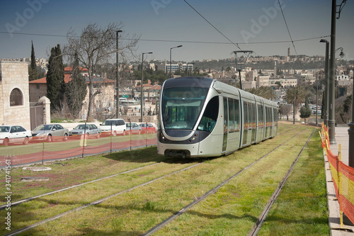 Israel - Jerusalem - Test flight of new modern city tramway train going up along with HaTsanhanim street