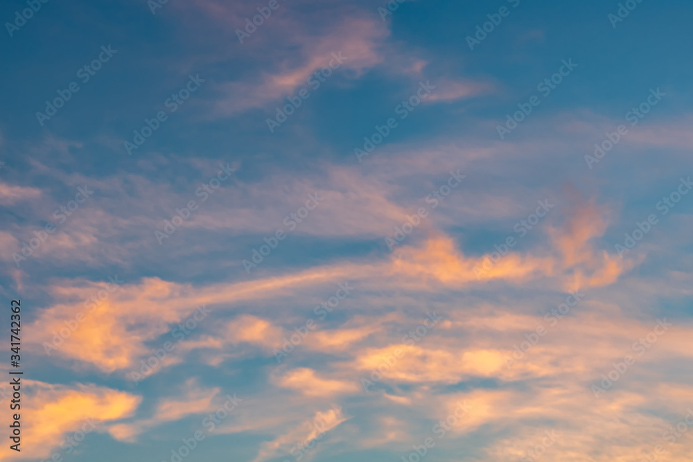 Dramatic cloudy sky during sunset, Texture of bright evening sky in twilight time background