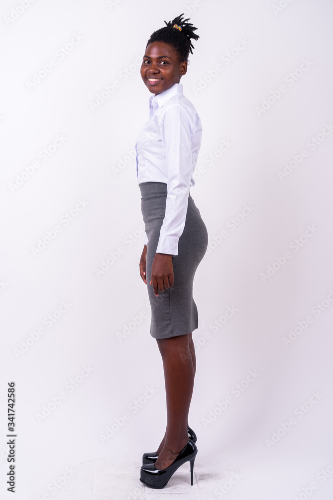 Full body shot of young beautiful African businesswoman Full body shot of young beautiful African businesswoman