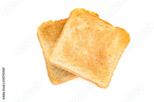 Two slicecs of toasted bread isolated on a white background in close-up (high details)