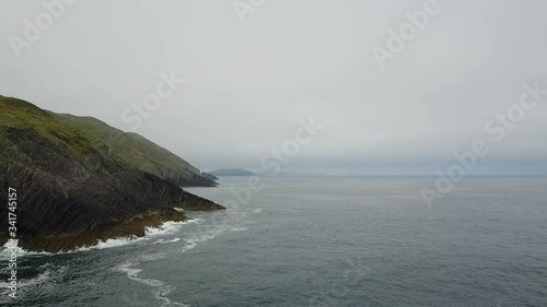 Aerial of misty Irish coastline 