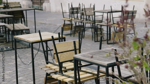 Close up shot of empty tables and chairs in the bar, restaurant, Ljubljana