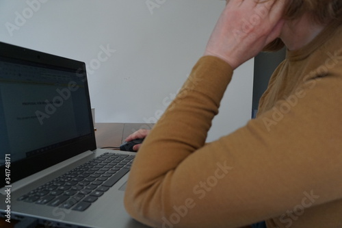 working on laptop