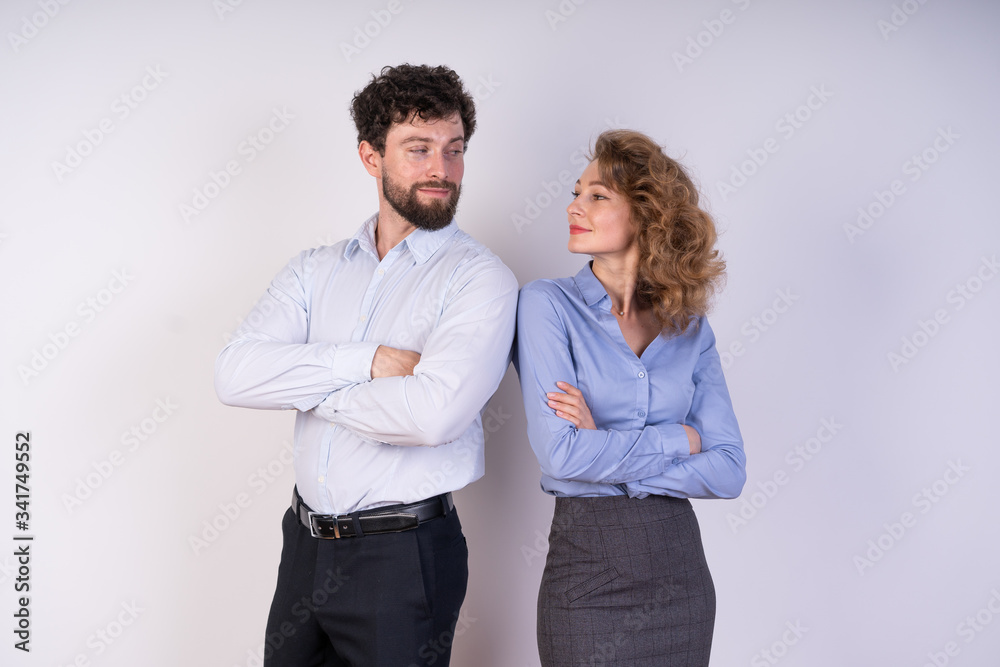 Guy and girl looking at each other, competition, determination, relationships, business Guy and girl looking at each other, competition, determination, relationships, business