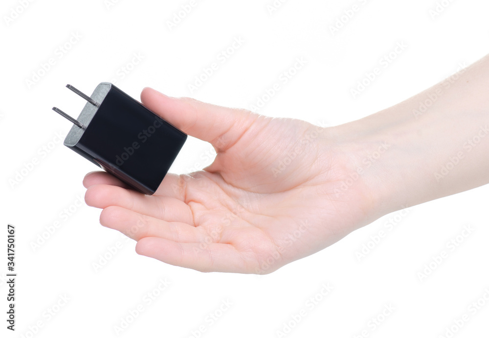 Power Supply usb in hand on white background isolation Power Supply usb in hand on white background isolation