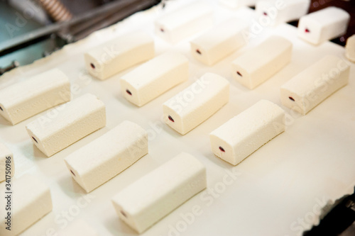 The production of sweet cottage cheese covered with chocolate