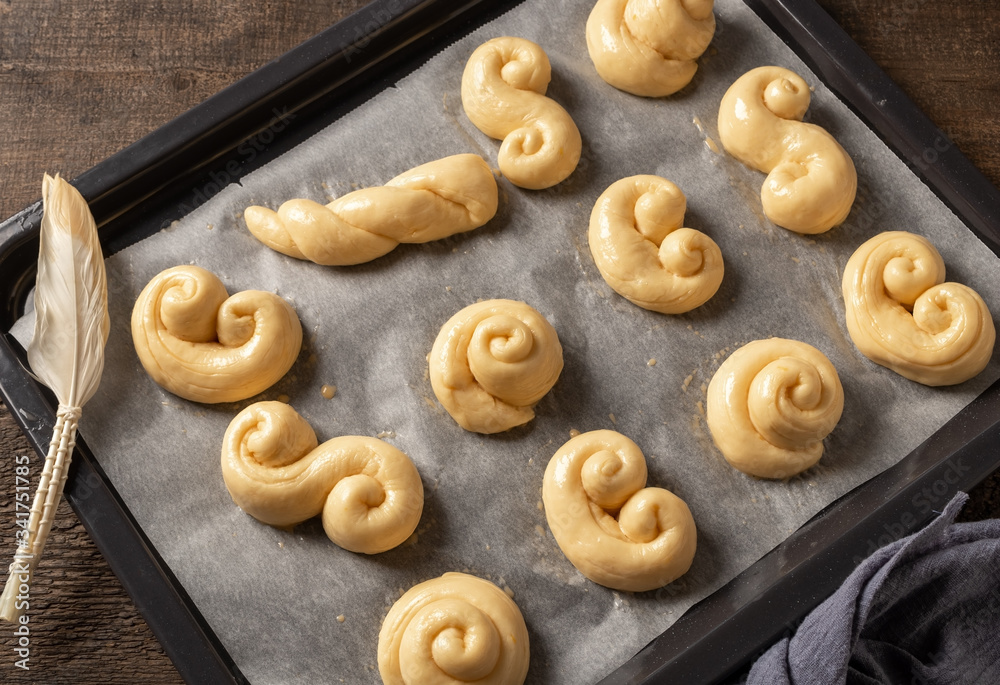 Naklejka premium Jidasky or jidase - traditional Czech sweet Easter pastry, before baking