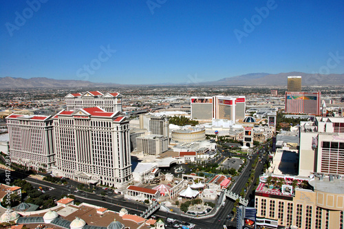 Caesars Palace and The Strip seen from Eiffel Tower replica at Paris Hotel and Casino  Las Vegas Nevada  USA photo