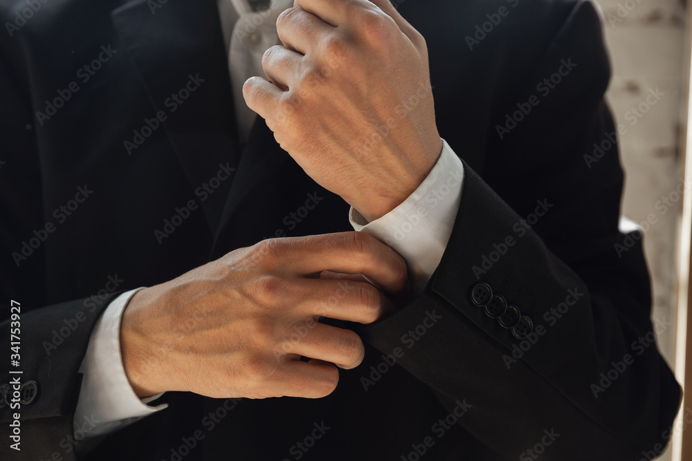 Wearing black jacket. Close up of caucasian male hands, working in office. Concept of business, finance, job, online shopping or sales. Copyspace for advertising. Education, communication freelance.