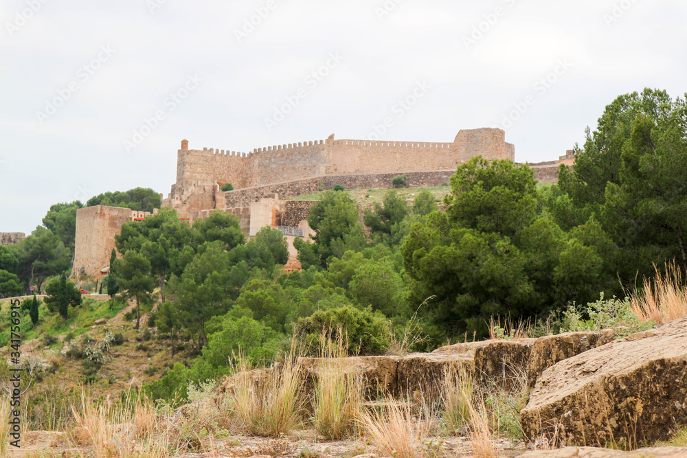 View from below to beautiful ruins of the medieval Sagunto castle in Spain View from below to beautiful ruins of the medieval Sagunto castle in Spain