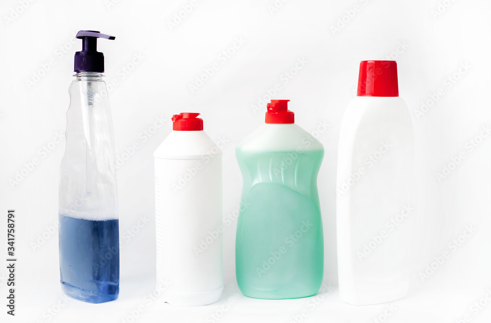 Some
different bottles with detergents and disinfectants on a white background Some
different bottles with detergents and disinfectants on a white background