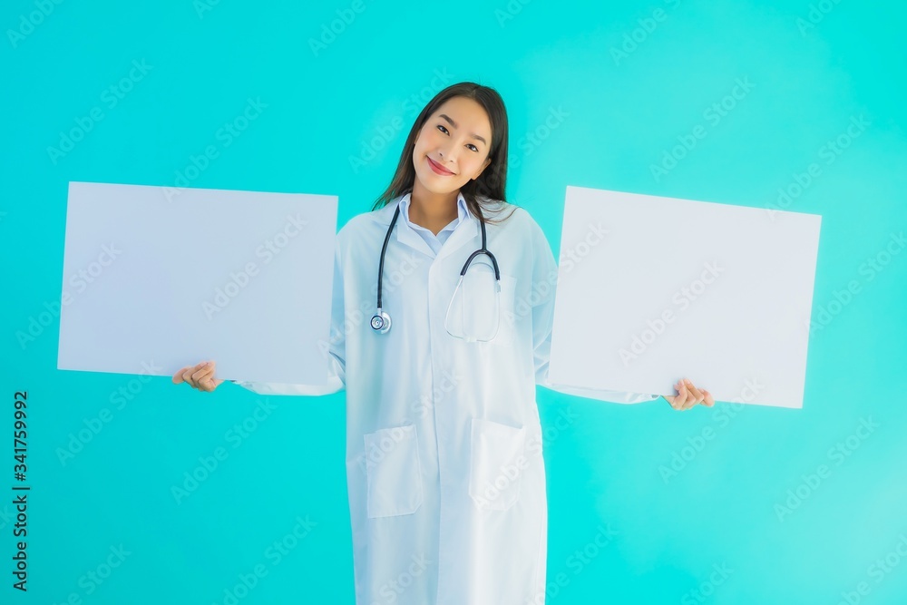 Portrait beautiful young asian doctor woman with empty card board Portrait beautiful young asian doctor woman with empty card board