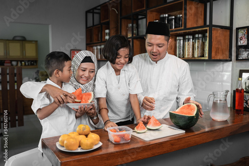 muslim asian family breaking the fast together