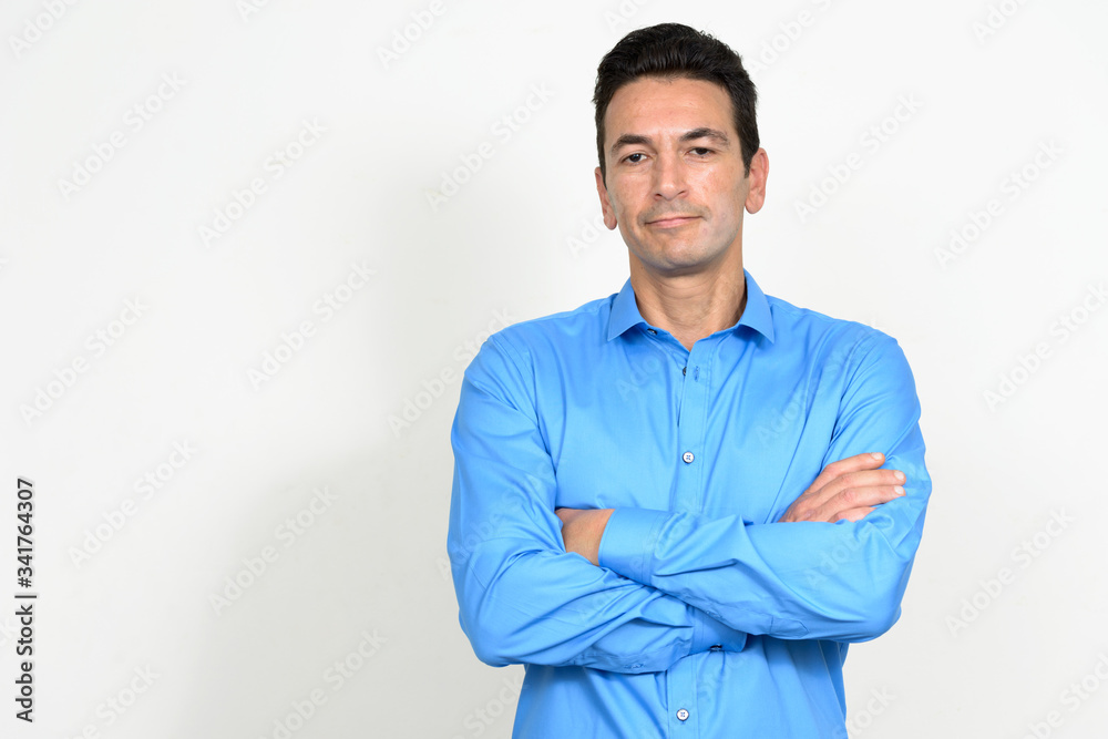 Portrait of mature handsome businessman with arms crossed Portrait of mature handsome businessman with arms crossed
