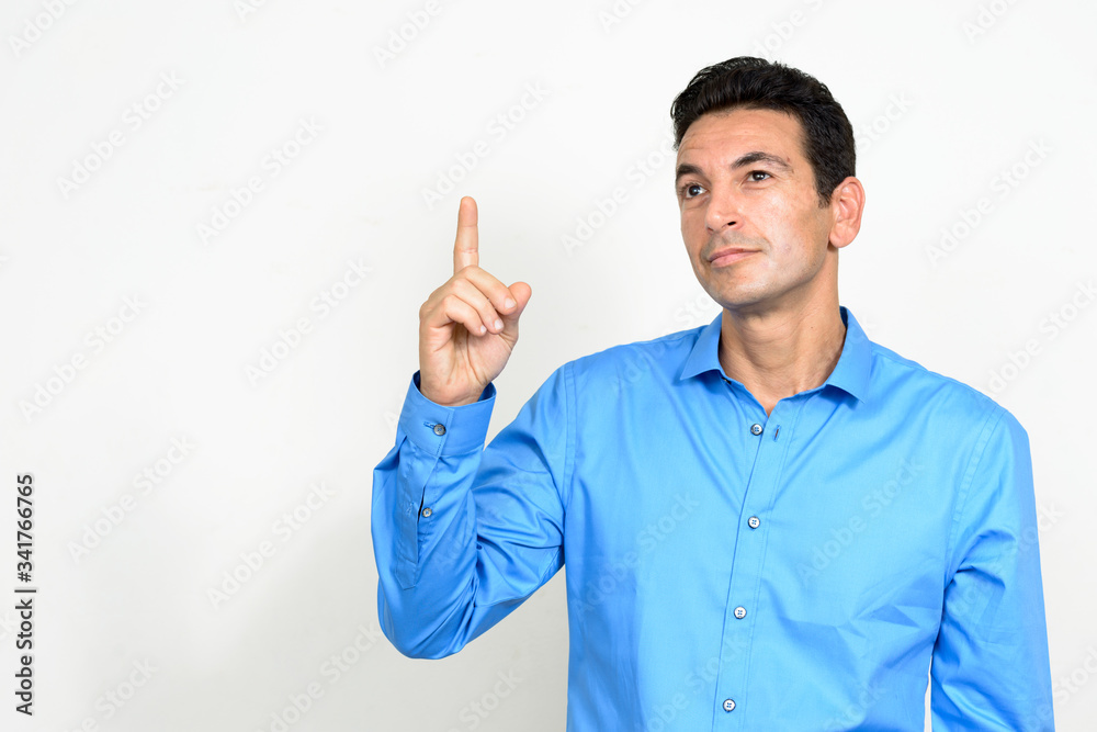 Portrait of mature handsome thinking and pointing up Portrait of mature handsome thinking and pointing up