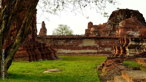 The crane shot video of the ancient ruins of Wat Maha That (Ayutthaya). Ayutthaya historical park Thailand
 photo