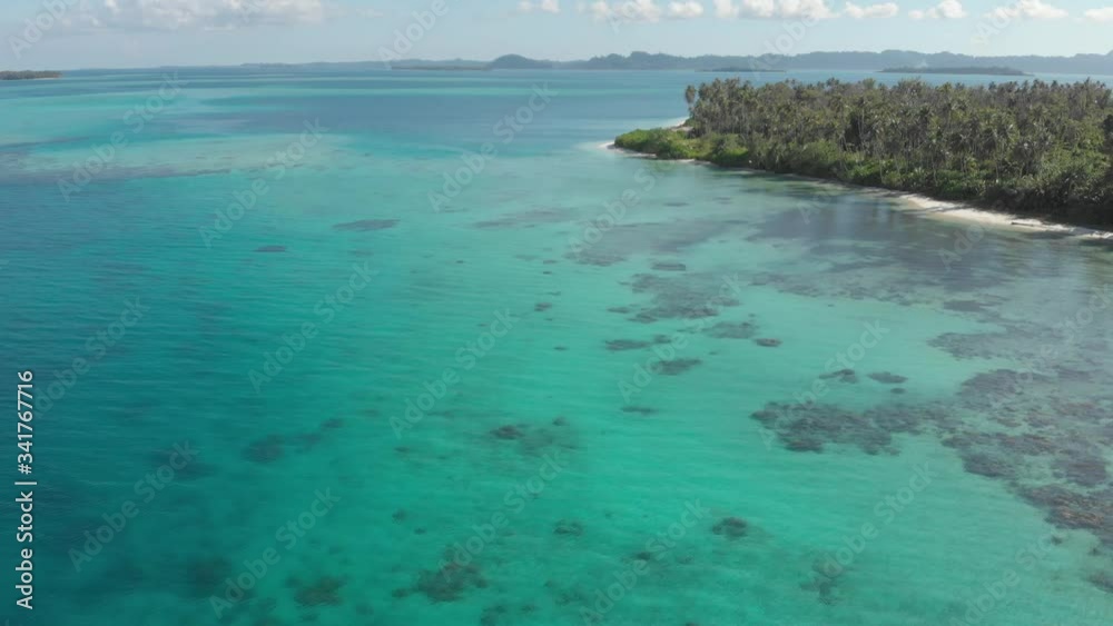 Aerial: flying over exotic white sand beach tropical island secluded destination away from it all, coral reef caribbean sea turquoise water. Indonesia Sumatra Banyak islands. Native cinelike D-log. Aerial: flying over exotic white sand beach tropical island secluded destination away from it all, coral reef caribbean sea turquoise water. Indonesia Sumatra Banyak islands. Native cinelike D-log.