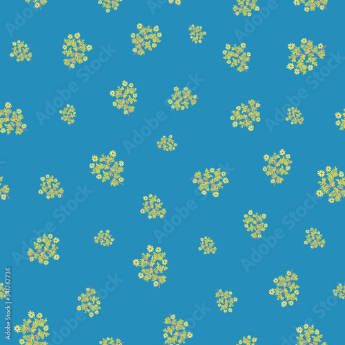 Ditsy wild flowers on a blue background seamless vector pattern. Feminine surface print design. For fabrics, stationery and packaging.