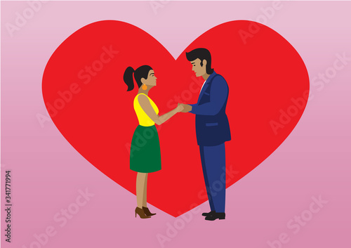 Lovers boy and girl, loving couple look at each other against the background of a red heart