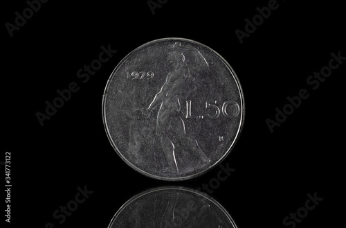 50 italian lira coin from 1979 isolated on black photo