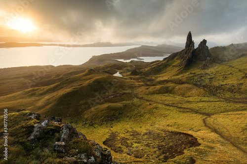 Landscape view at sunset with colourful clouds of Old Man of Storr rock formation, Scotland, United Kingdom.