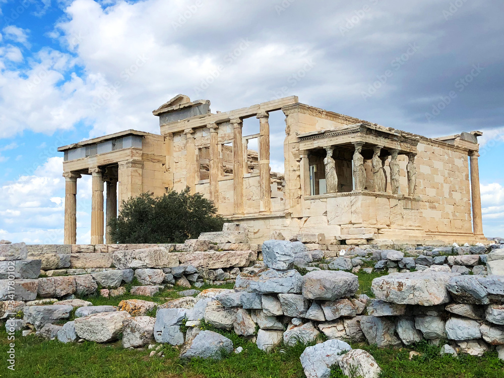 Erechtheion temple in Athens. Ruins of the Temple of Erechtheion and Temple of Athena at the Acropolis hill in Greece.