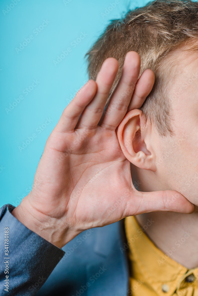 Fototapeta premium young man eavesdropping