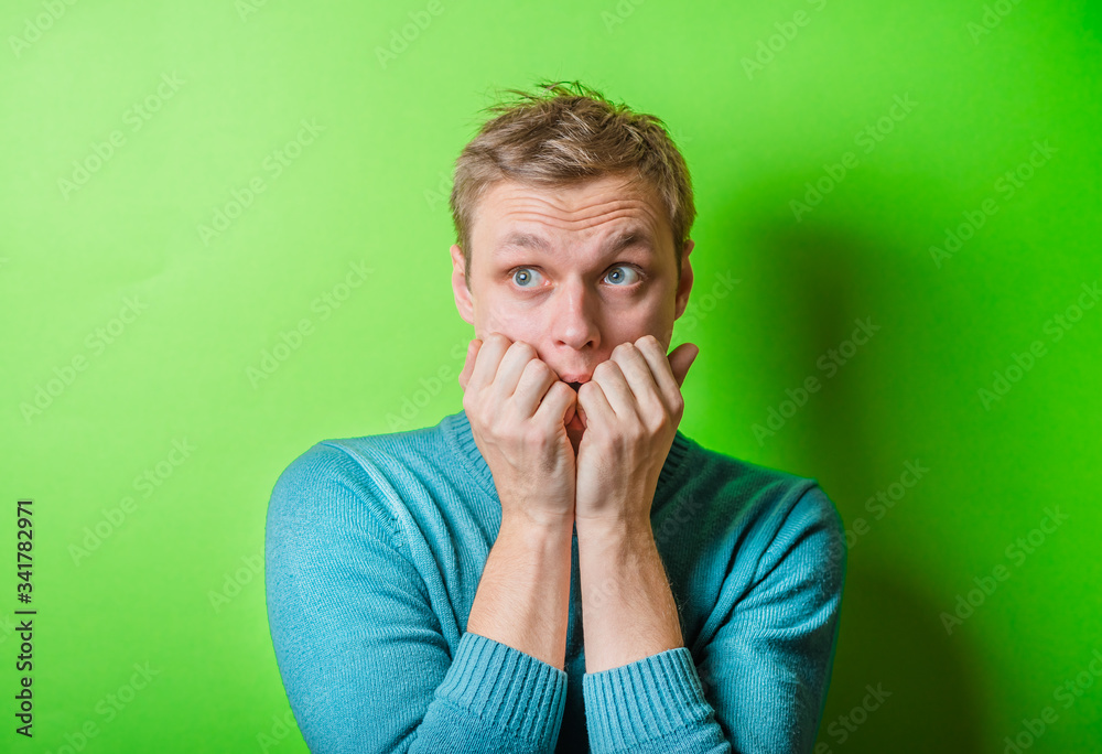 Young man looking scared Young man looking scared