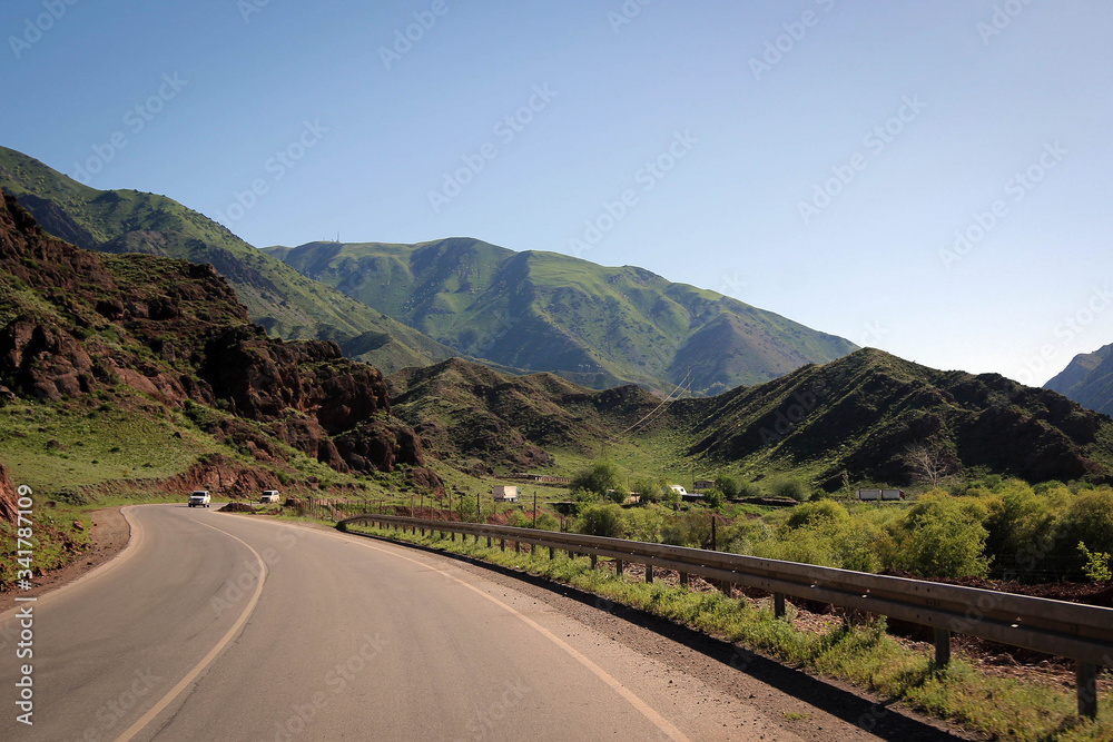 Calm green hills landscape near Jalal-Abad by spring, Kyrgyzia