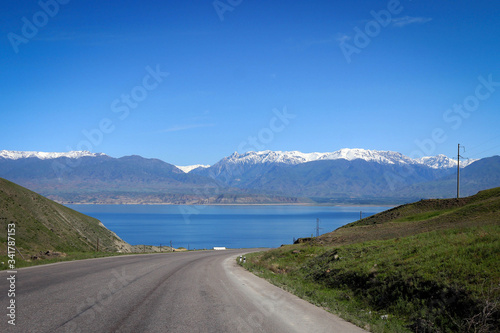 Toktogul Reservoir and Tian Shan mountains view by spring, Kyrgyzia © free2trip