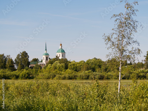 View of Kiowa Lake, Chaykino Lake Nature Reserve. Moscow region the city of Lobnya. Church of the Holy Face in Kiowa. photo