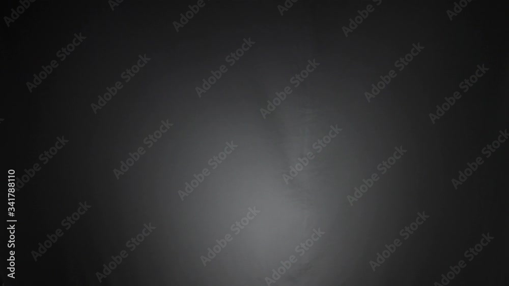 Dark screen with white curtain and flowing with the wind